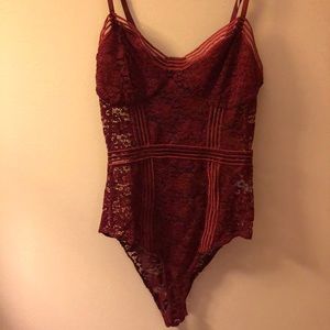 Red lace body suit